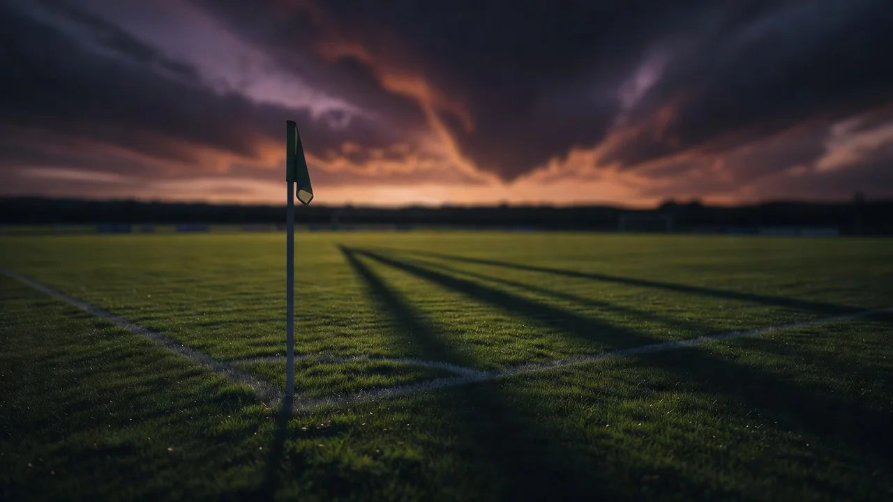 Corner flag on a football pitch at dusk